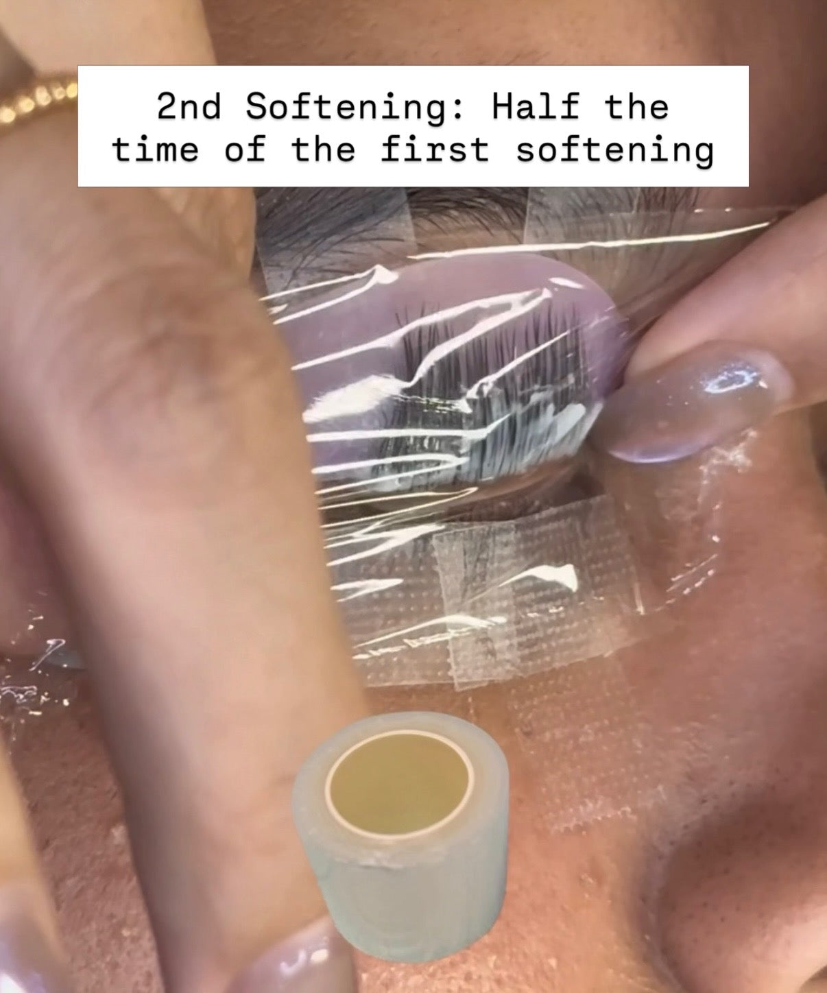 Korean lash lift 2nd Softening step – plastic wrap covering lashes with Lifted Lounge Perm Solution applied, half the time of first softening