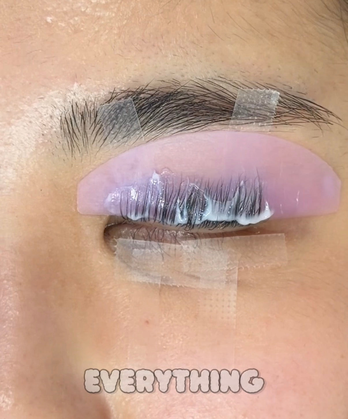 Korean lash lift treatment in progress – lashes on perm rod with Lifted Lounge Perm Solution applied