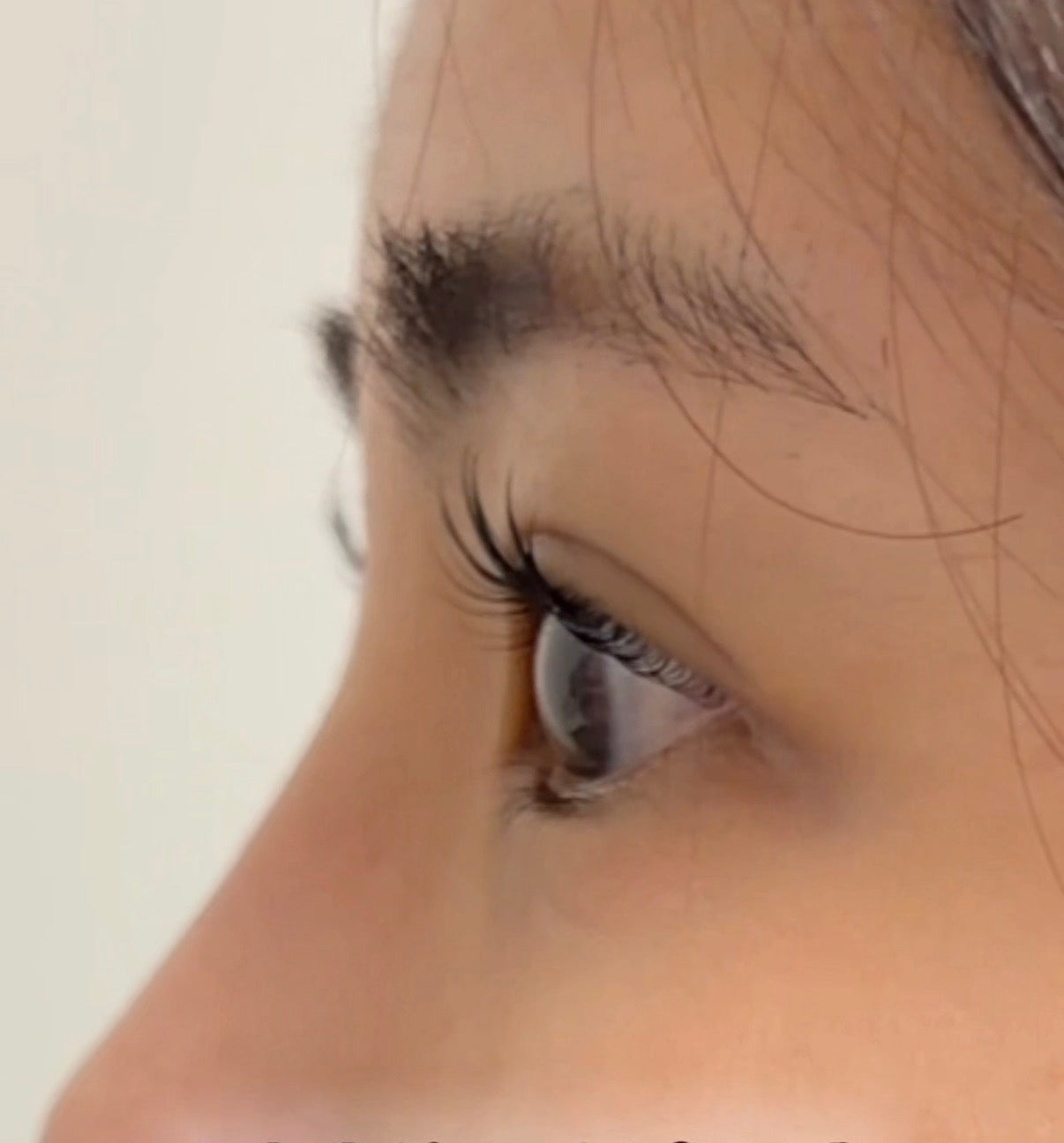Korean lash lift side profile result using Lifted Lounge Perm Solution – dramatic curled lash lift effect