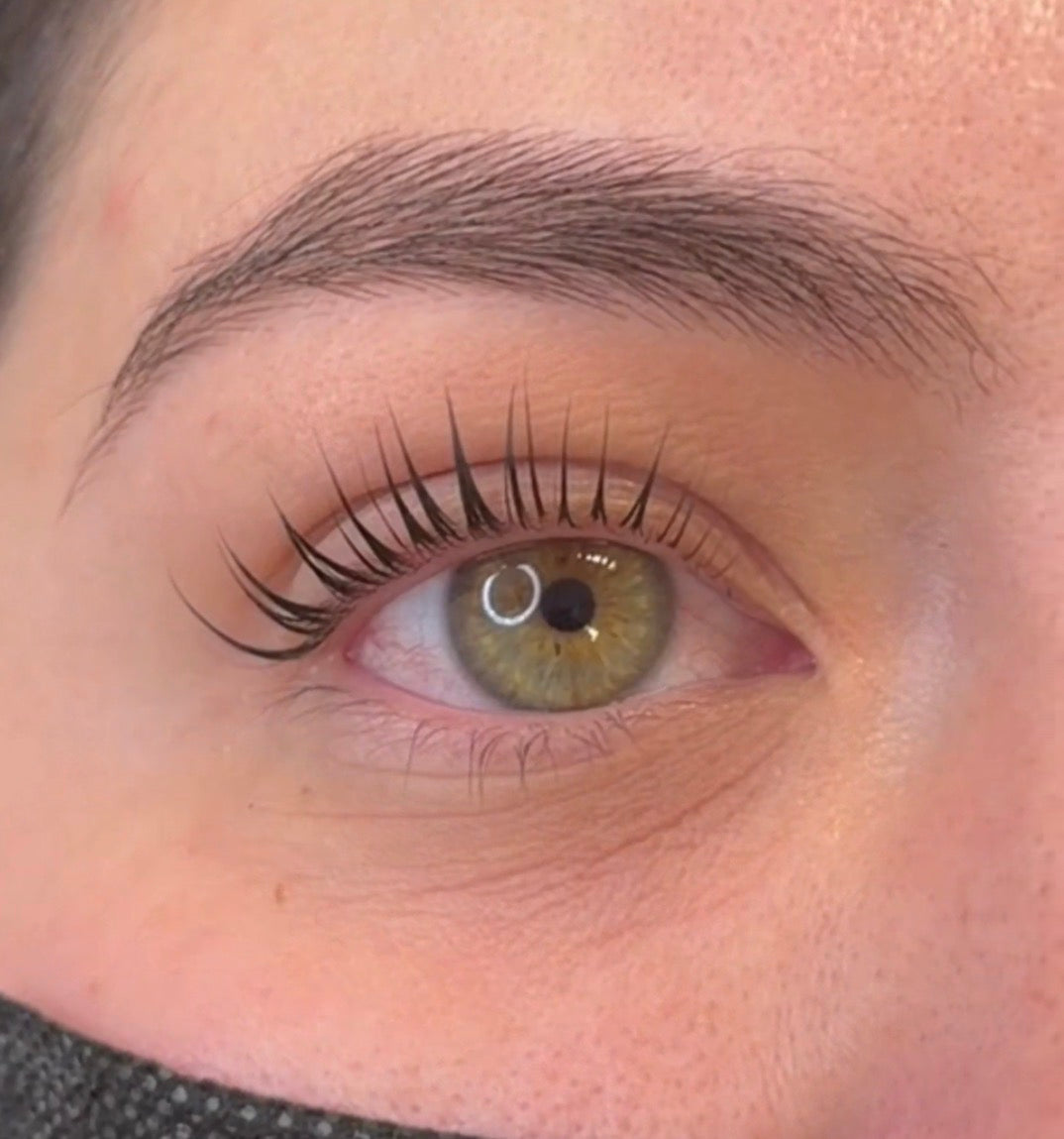 Korean lash lift result with Lifted Lounge Perm Solution – natural lifted lashes on green eye client
